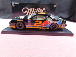 lot 41 image: Limited Edition Miller Genuine Draft Rusty Wallace #2 Winston Cup collectable