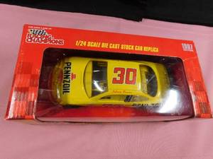 lot 52 image: 1997 Racing Champions edition of Johnny Benson #30 Pennzoil Nascar die cast car