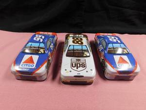 lot 64 image: 3 Nascar tins 2 Citco #99 and 1 UPS #88