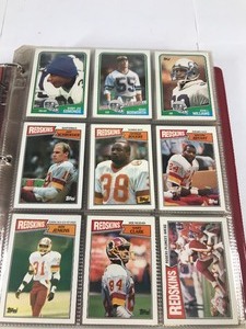 lot 240 image: Lot of 440 plus Football Cards in Binder in Protective Sleeves