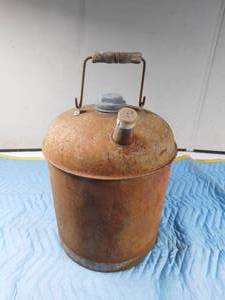 lot 128 image: Vintage gas can with wooden handle