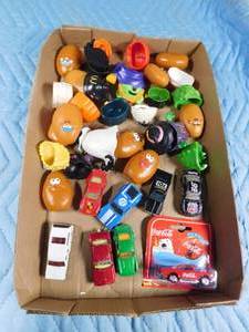 lot 143 image: Flat of die cast cars and lots of  McDonalds Mr. Potatoe head