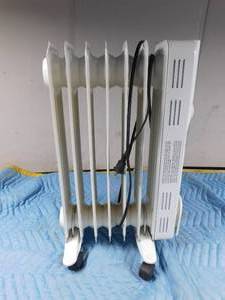 lot 148 image: Electric portable radiator heater