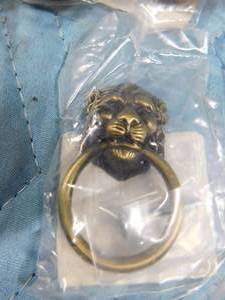 lot 151 image: Lot of lion head knobs