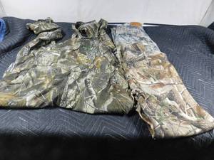 lot 174 image: Remington bib overalls and Cabella & Real Tree pants