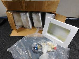 lot 290 image: Case of  new washing machine hook-up boxes