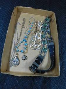 lot 322 image: Flat of necklaces and belt