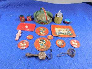 lot 333 image: Vintage metal doll dishes and sand sifter