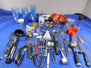 lot 344 image: Pepsi glasses, bunt cake pan, tea steamers, electric can opener and lots of utensils and more