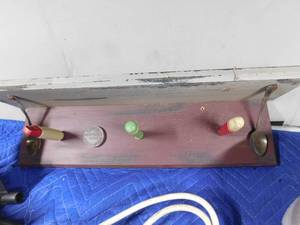 lot 346 image: Tote of Boots, shelf, auto tire pump, roll of foam wrap, surge protector extension cord, hinges, edging corners and couplers, flash light and more