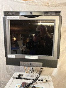 lot 35 image: Humanscale Healthcare Point of Care Carts Mobile Standing Desk with Polycom Monitor - Monitor Guaranteed To Work One Sold On Ebay For $1000 That Was Purchased From Us 