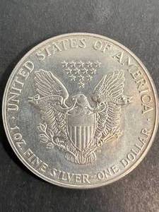 1987 AMERICAN SILVER EAGLE 1 TROY OZ .999 FINE SILVER