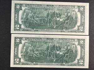 GROUP OF 2 CONSECUTIVE SERIAL NUMBERED $2 BILLS