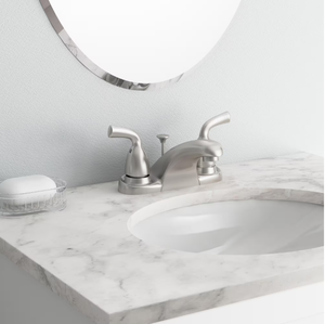 Delta Foundations 4 in. Centerset 2-Handle Low-Arc Bathroom Faucet with Metal Drain Assembly in Stainless
