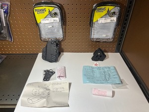 lot 331 image: (2) Pegasus by Desantis Holsters  CAZZUTO and C.H.A.M.P.