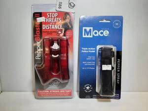 lot 586 image: (2) Pepper Spray