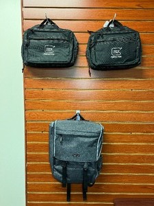 lot 555 image: Carbon Sesto Backpack Bag and (2) Glock Double Pistol Cases AP60300