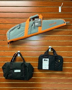 lot 635 image: US Peace Keeper Attache Case P21108, Savior Small Pouch Black, Allen Springs Compact Gun Case.