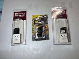 lot 884 image: (2) Springfield Armory 911 Magazines 9mm 6RD. (1)Versacarrier 9mm SINGLE Stack Magazine Carrier