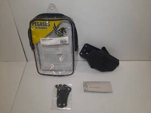 lot 986 image: Pegasus by Desantis Holsters  CAZZUTO (right) for Springfield
