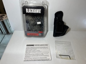 lot 1056 image: Blackhawk Leather Concealment Holster LEFT-HANDED