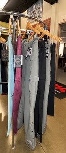 lot 697 image: (7) Girls with Guns Eclipse Leggings and Carbine Pants, (4) Size L and (1) XL, (2) 2XL