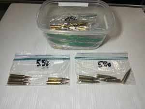 lot 1302 image: Bin of 5.56 Ammo Rounds