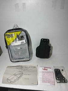 lot 1303 image: Pegasus Holster, Cazzuto (right) GGlock 45 with nightstick TCM