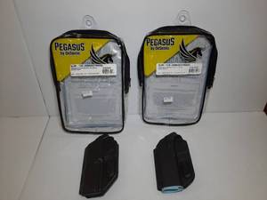 lot 1255 image: (2) Pegasus by DeSantis Slim Tuk Holster (ambidextrous), Springfield Echelon and Springfield Prodigy
