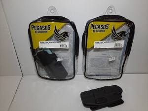 lot 1233 image: (2) Pegasus by DeSantis Slim Tuk Holster (ambidextrous). Springfield SA-36