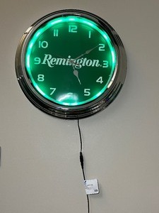 lot 69 image: Lighted Wall Clock Analog, Remington, 16 inch dia.