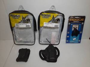 lot 1350 image: (3) Holsters or Pouches Pegasus Quantico Single Mag Pouch Pegasus Facilitator Holster Hogue Beaver Tail Grip Sleeve P365