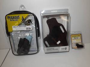 lot 1358 image: Firearm Accessories Versacarry Leather Holster Pegasus by DeSantis Slim Tuk Pearce Grip Extension Ruger