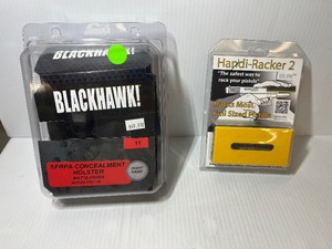 lot 1404 image: (2) Firearm Accessories Blackhawk Leather Holster, Serpa Concealment, Right, Ruger P8589, # 11 Handi-Racker 2