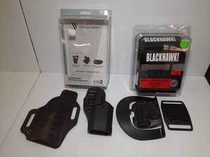 lot 1395 image: (2) Firearm Holsters Versacarry Comfort Flex Deluxe IWB Hybrid, Size 2 Blackhawk Serpa Concealment Holster, Ruger P85
