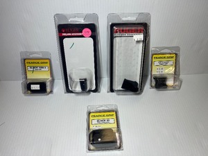 lot 1453 image: Firearm Accessories (2) Ruger LCPII Magazine Flat Floor Plate  (3) Pearce Grip