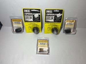 lot 1457 image: Firearm Accessories (2) HKS Speedloader, Reloads revolvers instantly (3) Pearce Grip S&ampW M&ampP Shield Plus grip extension
