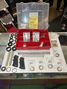 lot 1483 image: Red Tool Box with Misc. Rifle Parts