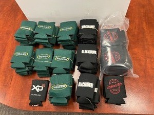 lot 1439 image: Promotional Drink Cozies 22 Heckler & Koch, Black 28 Blackhawk, Black 1 XDS Pistol, 64 Weaver, Green