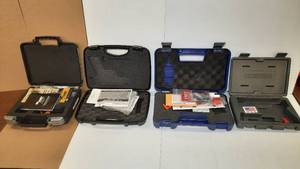 lot 1521 image: (4) Gun cases without guns  (2) Smith & Wesson M&P 22, Sig Sauer, Ruger