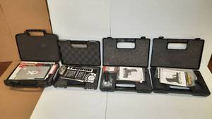 lot 1509 image: (4) Gun cases without guns Springfield XDS Taurus Plastic Pistol (2) Walther Cases