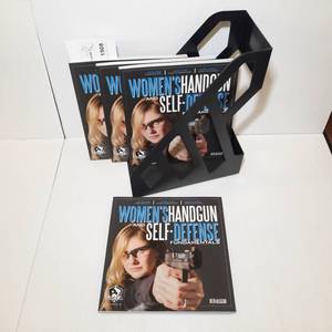 lot 1508 image: (4) Womens Handgun and Self-defense Fundamentals with Book Holder