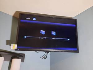 lot 825 image: Westinghouse Flat Screen TV with wall mount.