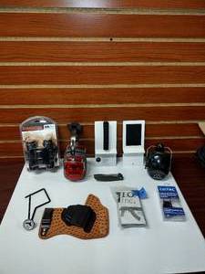 lot 1586 image: (9) Firearm Accessories Tasco 10X Binoculars NRA Knife Walker & Ruger Muffs CoiTac Recorder Video