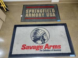 lot 1618 image: (2) Advertising Floor Mats, Springfield Armory USA, 47 x 24 and Savage Arms, 59 x 34