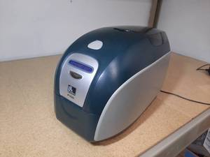 lot 45A image: Zebra P100i Card Printer, single-sided, single-feed card printer with USB connectivity.