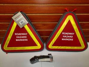 lot 1713 image: Roadway Hazard Markers North American Rescue Combat Application Tourniquet