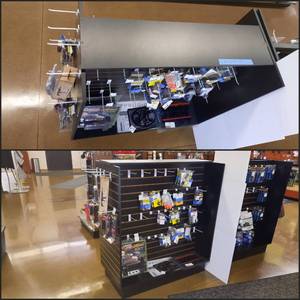 lot 1716 image: Black Wood Double-Sided Slatwall Merchandiser on solid base