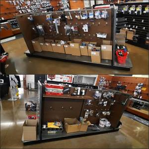 lot 1718 image: Pegboard Gondola Store Shelving Island, accompanied by two end-cap displays