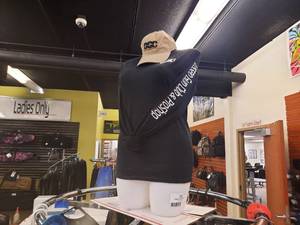 lot 1731 image: Upper Torso Mannequin, stands 34 H. Shirt and hat included.